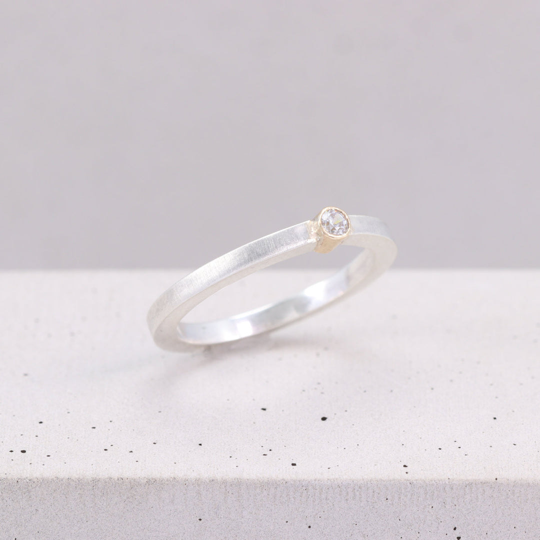 Brushed Silver Ring with Gold Set CZ