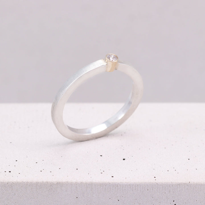 Brushed Silver Ring with Gold Set CZ