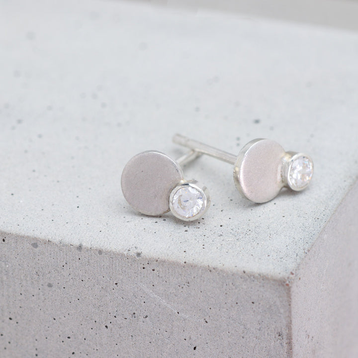 Sterling silver and moissanite circle stud earrings side