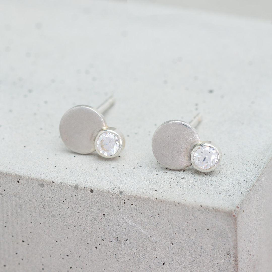 Sterling silver and moissanite circle stud earrings