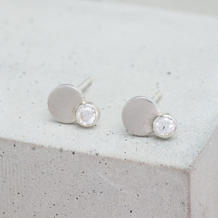 Sterling silver and moissanite circle stud earrings