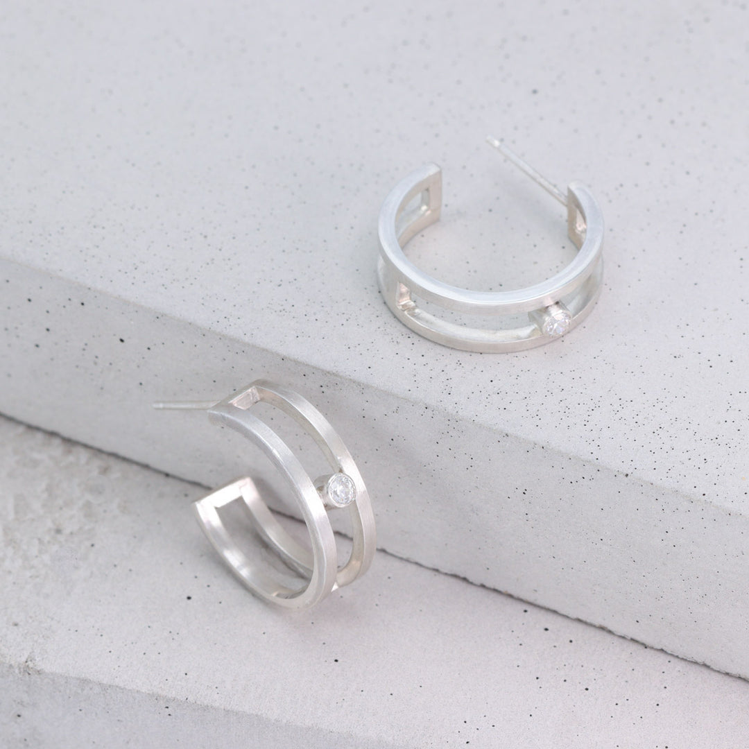 Handmade sterling silver double hoop earrings with moissanite and satin finish