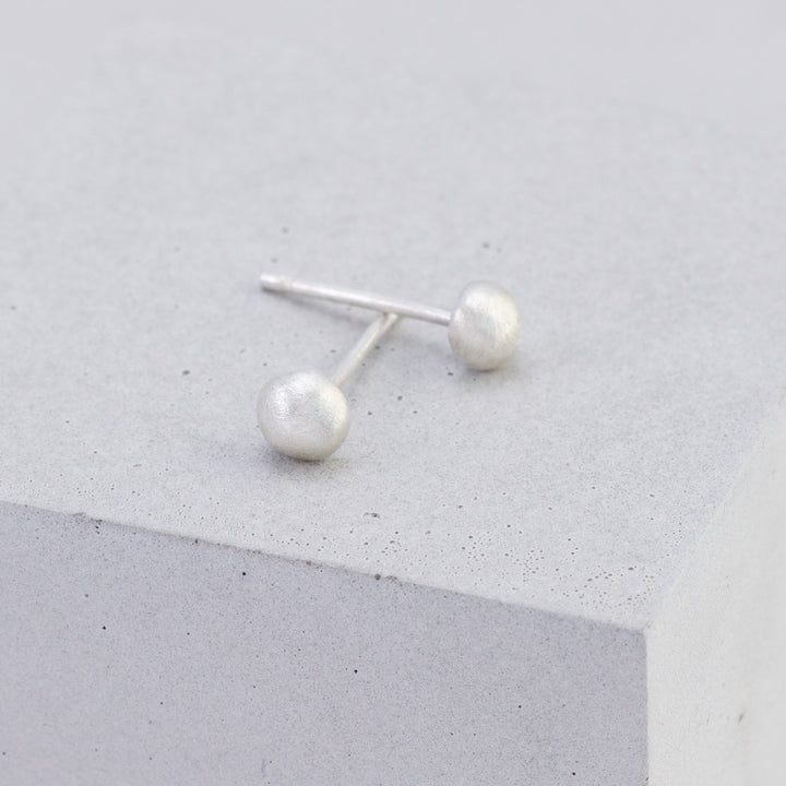 Handmade 4mm sterling silver stud earrings with frosted finish