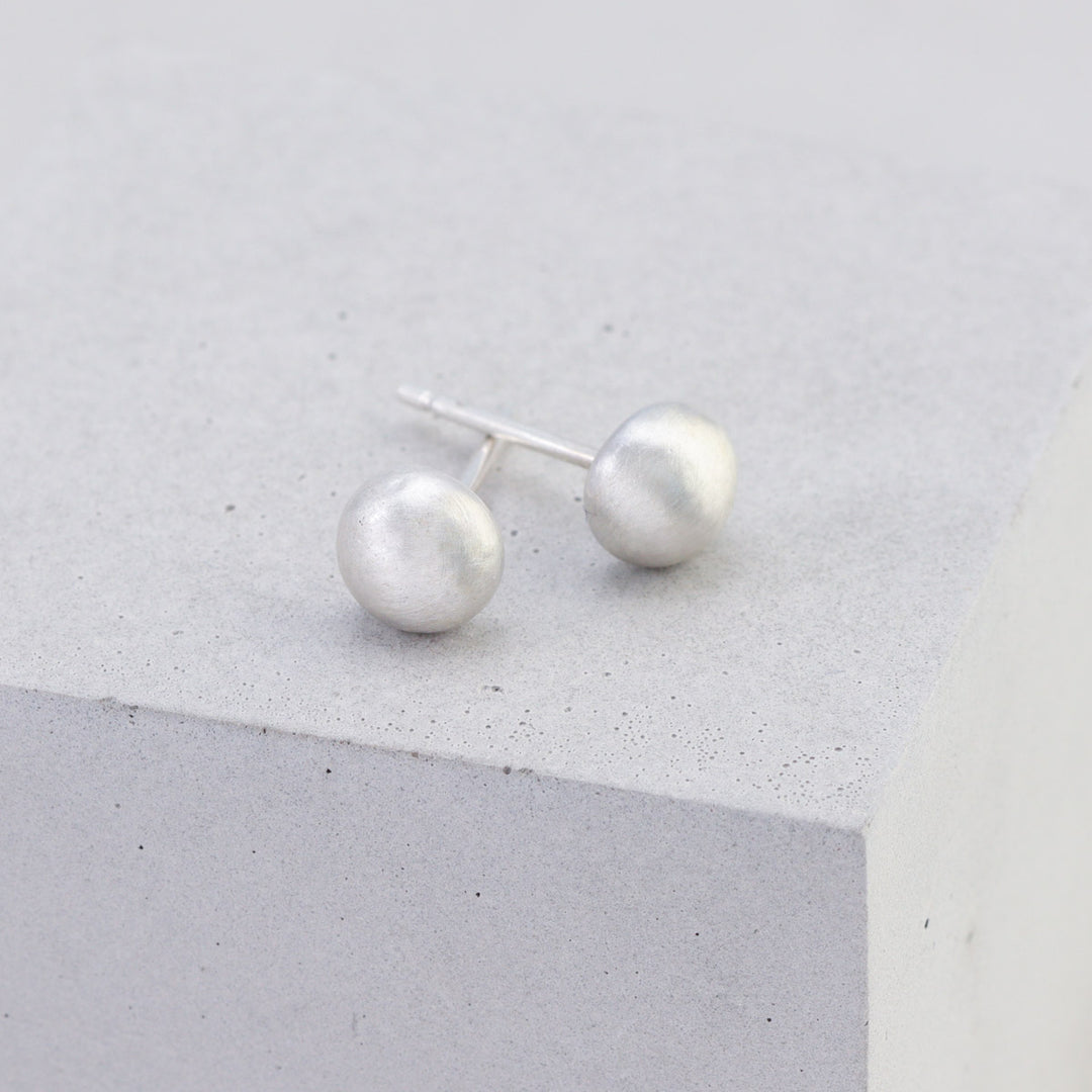 Handmade 5.6mm sterling silver stud earrings with frosted finish