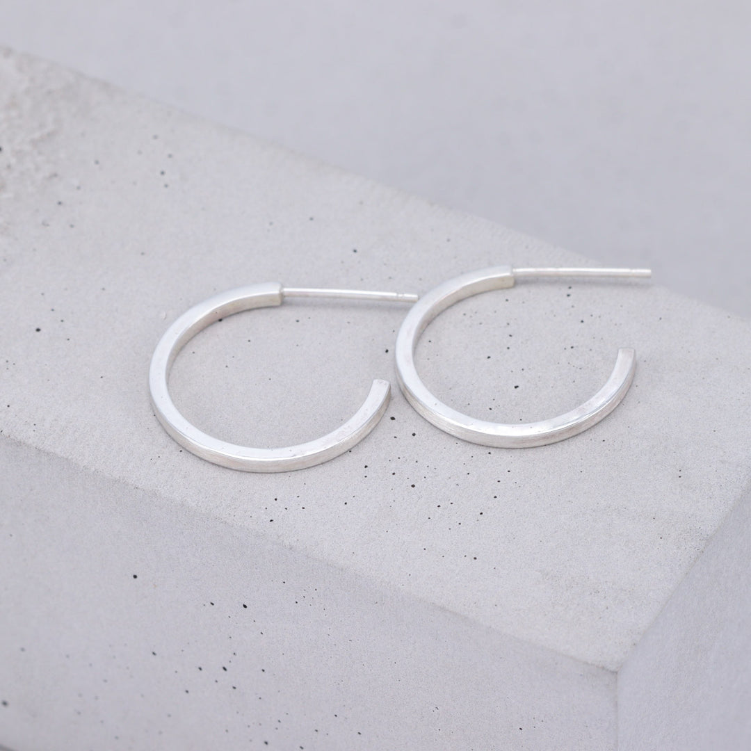 Medium brushed sterling silver hoop earrings handmade by Ruth Sims Jewellery