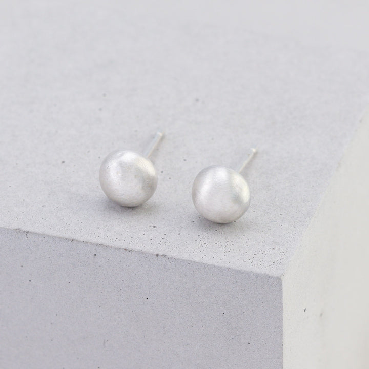 Medium 5.6mm frosted sterling silver stud earrings handmade from recycled silver