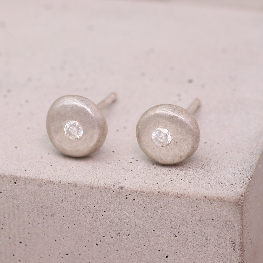 Recycled sterling silver pebble stud earrings set with moissanite