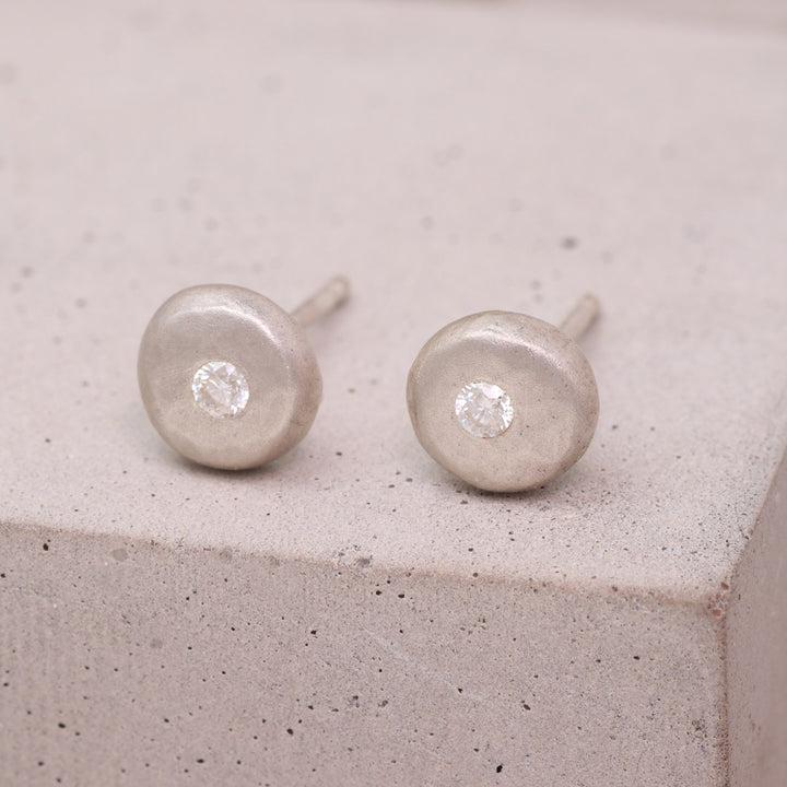 Recycled sterling silver pebble stud earrings set with moissanite